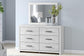 Cayboni Queen Panel Bed with Mirrored Dresser and Nightstand