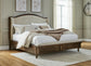 Sturlayne California King Upholstered Panel Bed, Dresser, Mirror, Chest and Nightstand