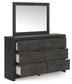 Delmorta Queen Panel Bed, Dresser, Mirror, Chest and Nightstand