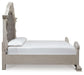 Andonhall California King Upholstered Panel Bed with Mirrored Dresser
