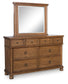 Chadworth Queen Poster Bed with Mirrored Dresser